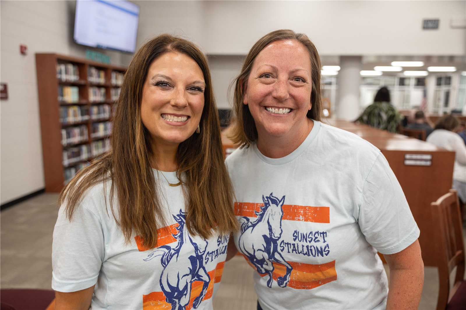 Principal and Assistant Principal smiling